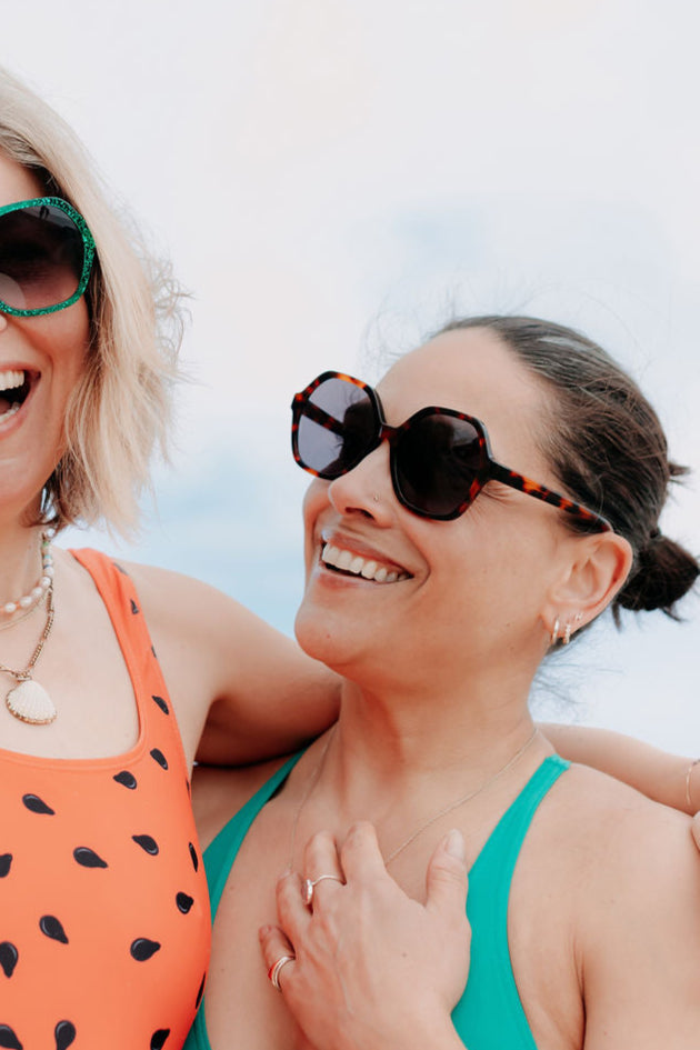 Close-up of tortoise shell sunglasses highlighting the detailed frame design.