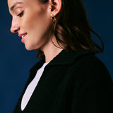 Cowrie Merino Wool Polo Jumper in Black