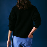 Cowrie Merino Wool Polo Jumper in Black