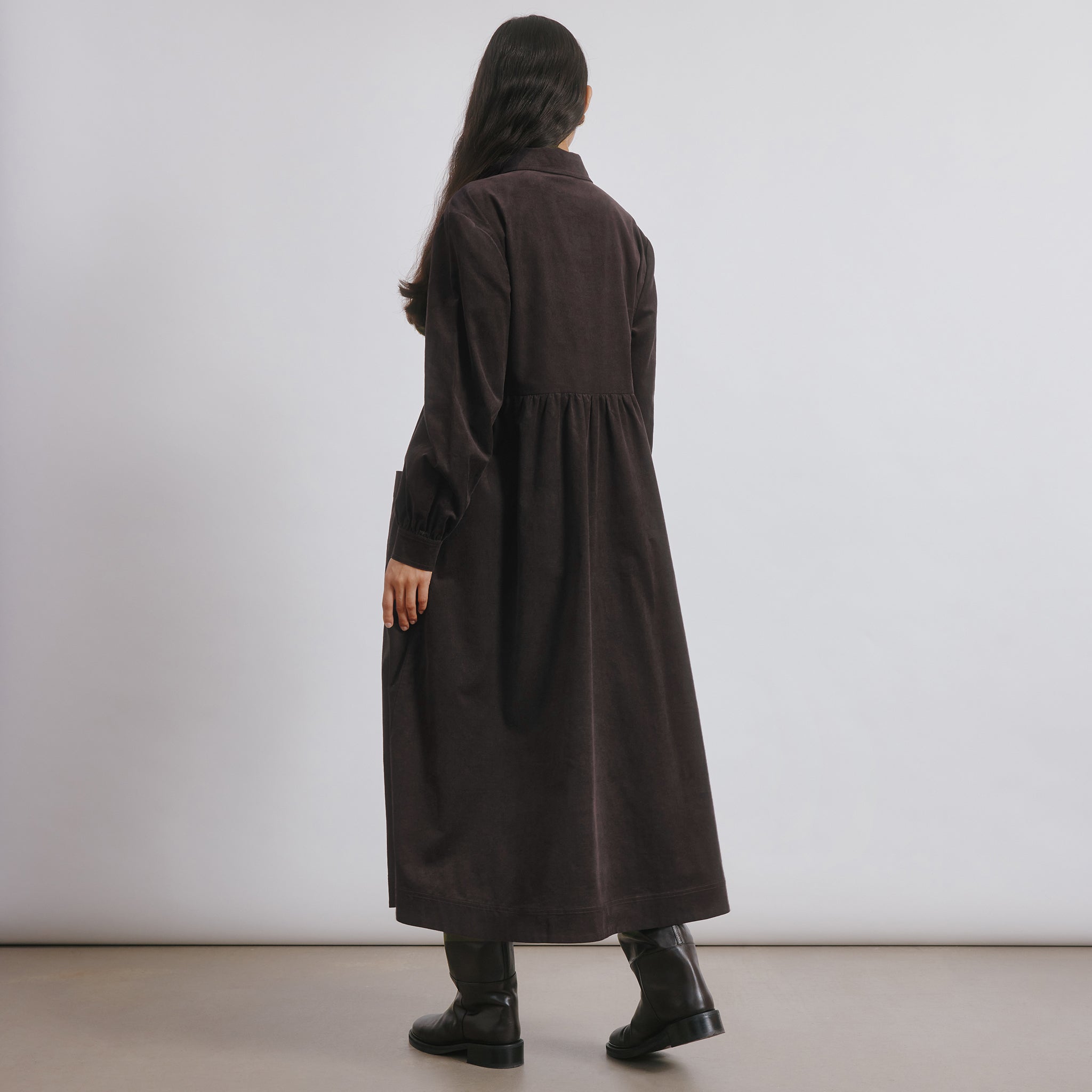 Brown cord midi dress with button placket and collar in soft organic cotton corduroy.