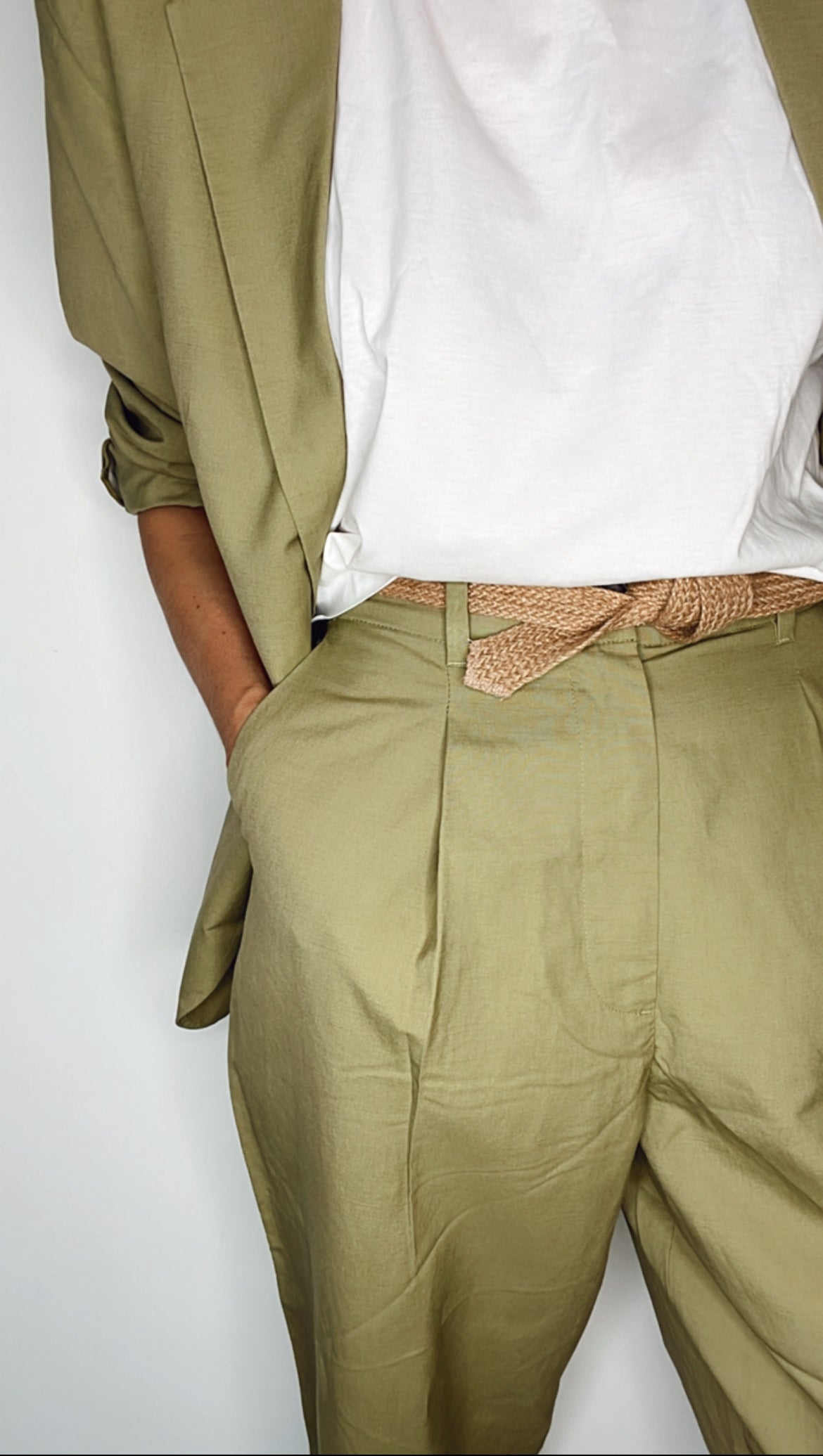 Detail shot of a handmade tie belt with biodegradable jute fibers.