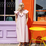 Stylish A-line maxi dress with V-neck and delicate ruffle neckline, perfect for summer.