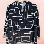 Black and white shirt with a check pocket