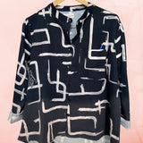 Black and white shirt with a check pocket
