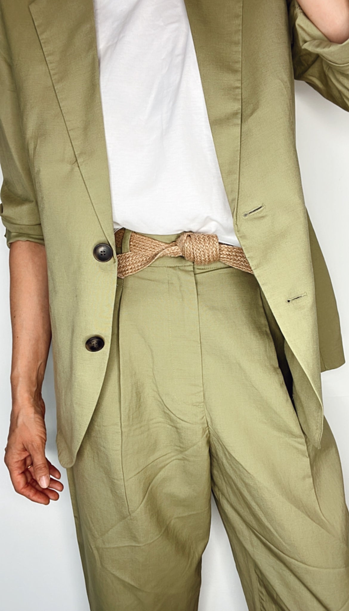 Handmade women's belt wrapped neatly, highlighting biodegradable craftsmanship.