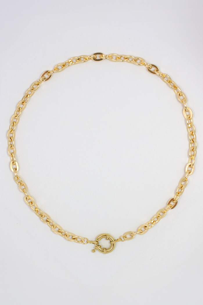 Close-up of gold plated chunky chain necklace highlighting the chunky front clasp.