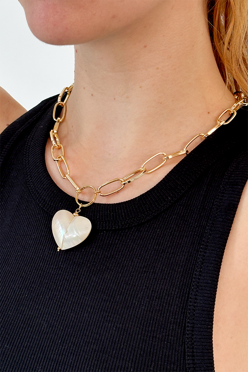 Mother of pearl pendant necklace with chunky gold plated chain for statement style.