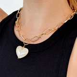 Mother of pearl pendant necklace with chunky gold plated chain for statement style.