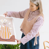 Daisies in Striped Vase
