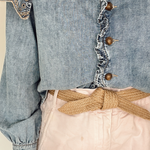Close-up of biodegradable tie belt showcasing woven texture and natural fibers.
