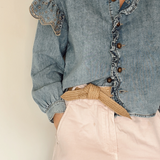 Biodegradable tie belt styled with natural light highlighting fiber details.
