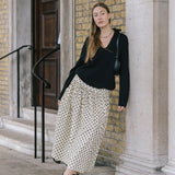 Cowrie Merino Wool Polo Jumper in Black