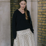 Cowrie Merino Wool Polo Jumper in Black