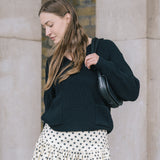 Cowrie Merino Wool Polo Jumper in Black