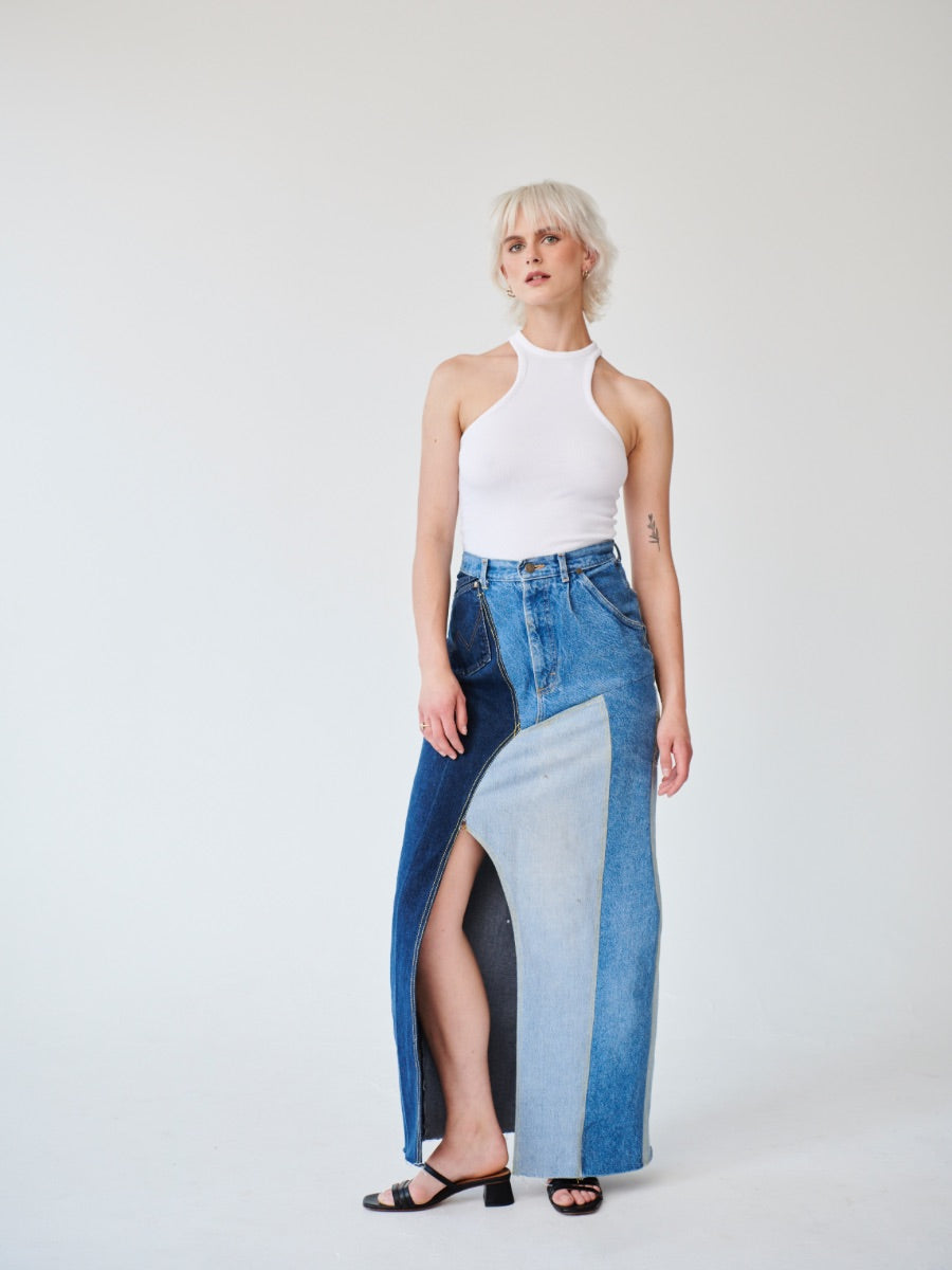 Embrace sustainability with our new upcycled denim maxi skirt. Crafted with love and a commitment to the environment, each skirt tells a unique story while reducing fashion waste.