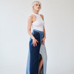 Embrace sustainability with our new upcycled denim maxi skirt. Crafted with love and a commitment to the environment, each skirt tells a unique story while reducing fashion waste.