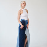 Embrace sustainability with our new upcycled denim maxi skirt. Crafted with love and a commitment to the environment, each skirt tells a unique story while reducing fashion waste.