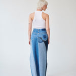 Embrace sustainability with our new upcycled denim maxi skirt. Crafted with love and a commitment to the environment, each skirt tells a unique story while reducing fashion waste.
