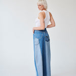 Embrace sustainability with our new upcycled denim maxi skirt. Crafted with love and a commitment to the environment, each skirt tells a unique story while reducing fashion waste.