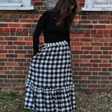 woman wearing winter gingham skirt