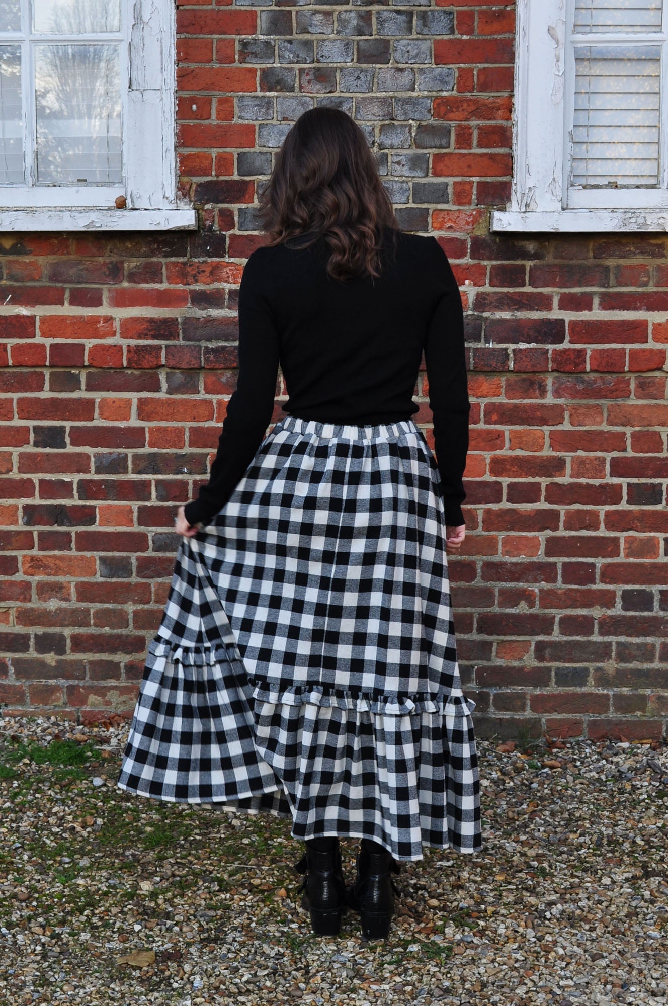 woman wearing gingham skirt with ruffle