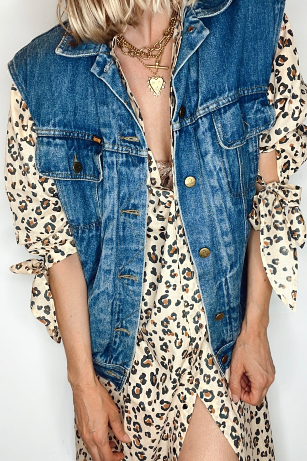 Animal print a-line midi dress with balloon sleeves and tie cuffs made from organic cotton summer fabric.