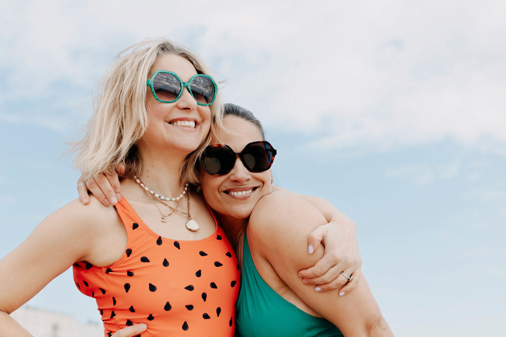 Tortoiseshell sunglasses with wide arms and glossy finish.