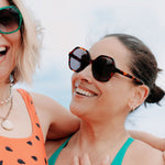 Close-up of tortoise shell sunglasses highlighting the detailed frame design.