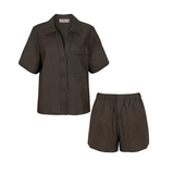 Relaxed fit linen two piece set with short sleeve button down shirt and high waisted shorts.