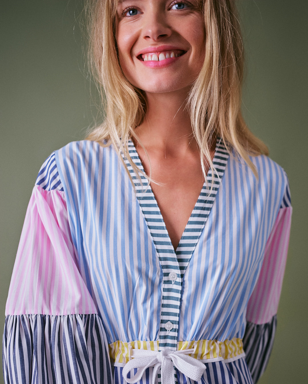 Cotton sundress with balloon sleeves, cinched waistline, and multicolour stripes in a maxi length.