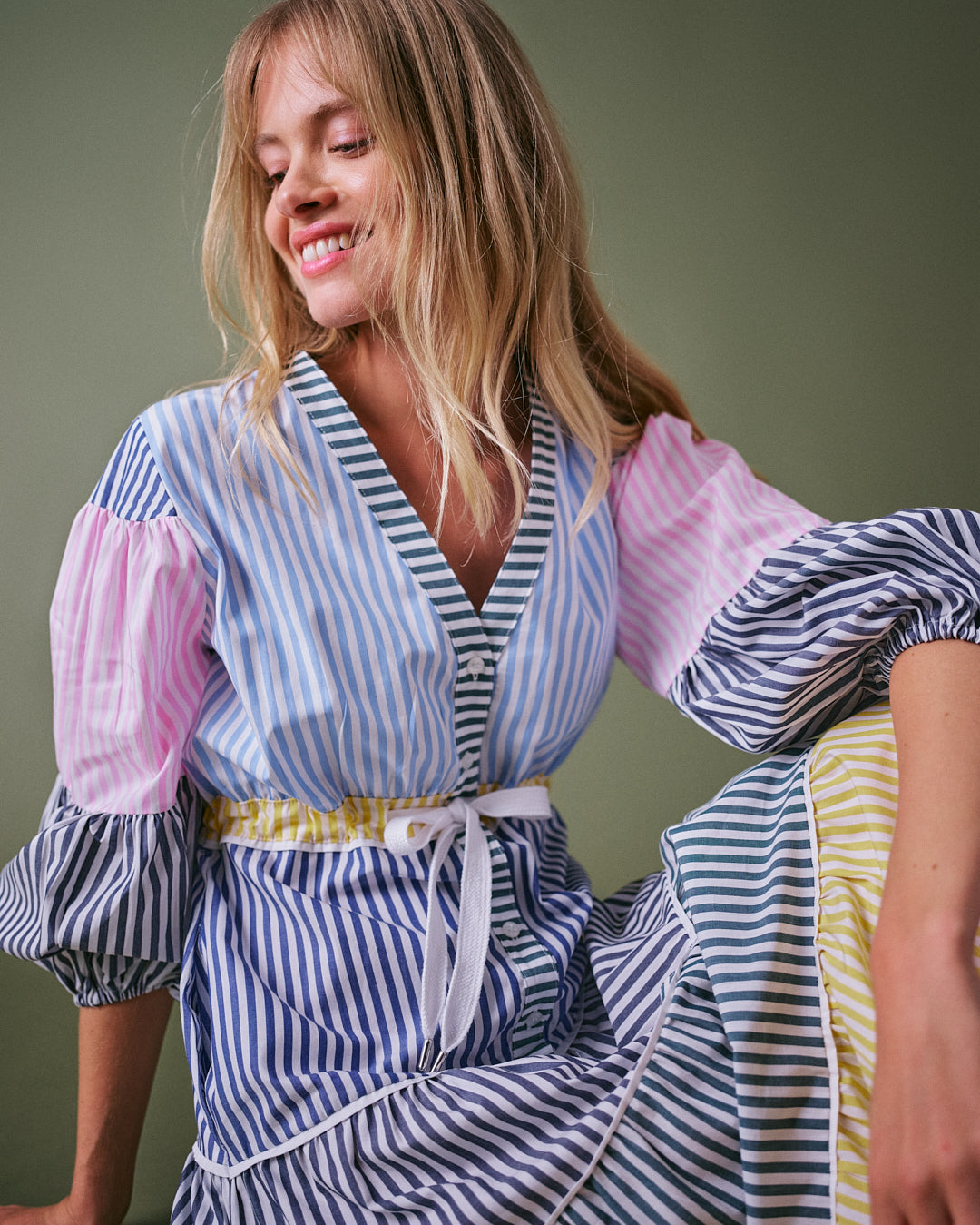V-neck stripe maxi dress with tiered skirt and button down front, perfect for summer.