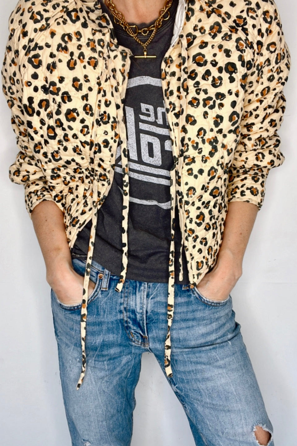 Animal print cotton jacket with a tie front and relaxed fit for casual wear.