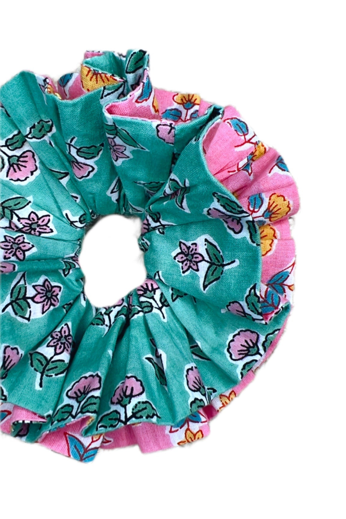 Oversized green floral scrunchie with large fabric folds for a statement look.