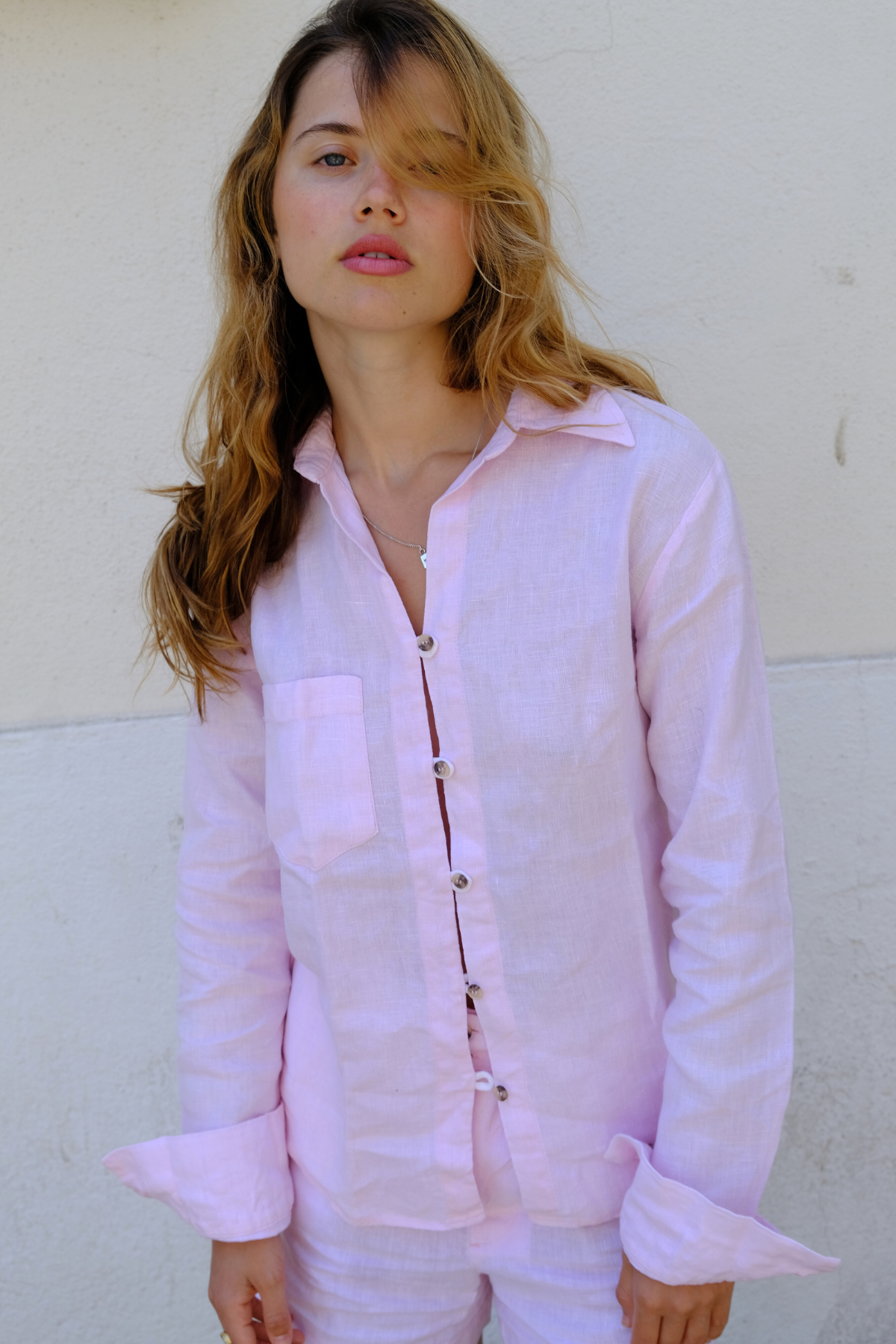 pure linen pink shirt with white button detailing 