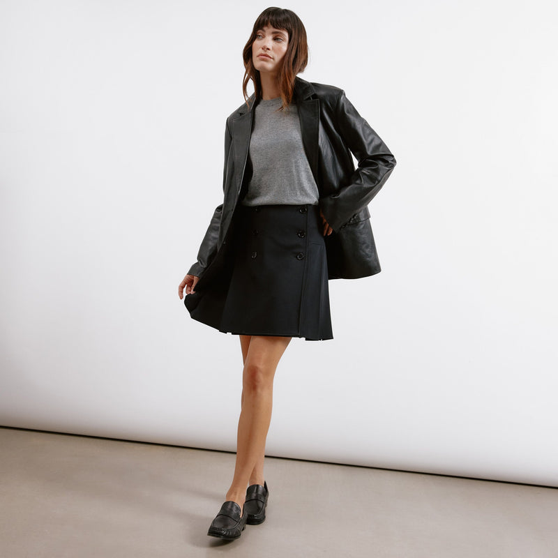 Black Tailored Pleat Mini Skirt by Albaray