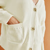 Cream Relaxed V Neck Cardigan by Albaray