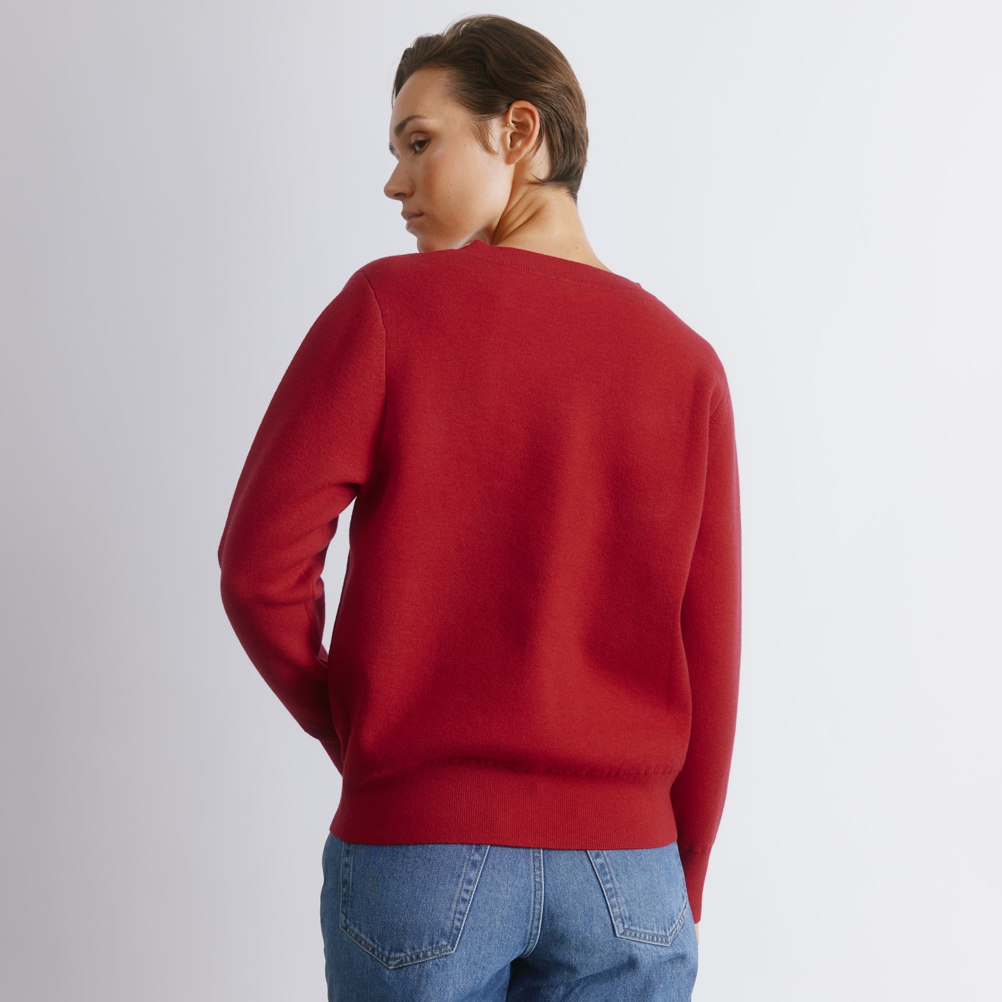 Bright red jumper with relaxed fit wool blend knit, soft and cosy wool sweater perfect for winter layering, sustainable and eco-friendly wool blend knitwear