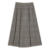 Versatile check pleated skirt crafted with a fitted waist and mid-length design for a refined winter look.