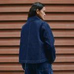 Indigo denim jacket, A-line denim jacket, contrast stitch denim jacket, button-front denim jacket, casual denim outerwear, organic cotton denim jacket, sustainable denim jacket, ethically made jacket