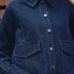 Indigo denim jacket front view, button details, casual denim outerwear, sustainable fashion