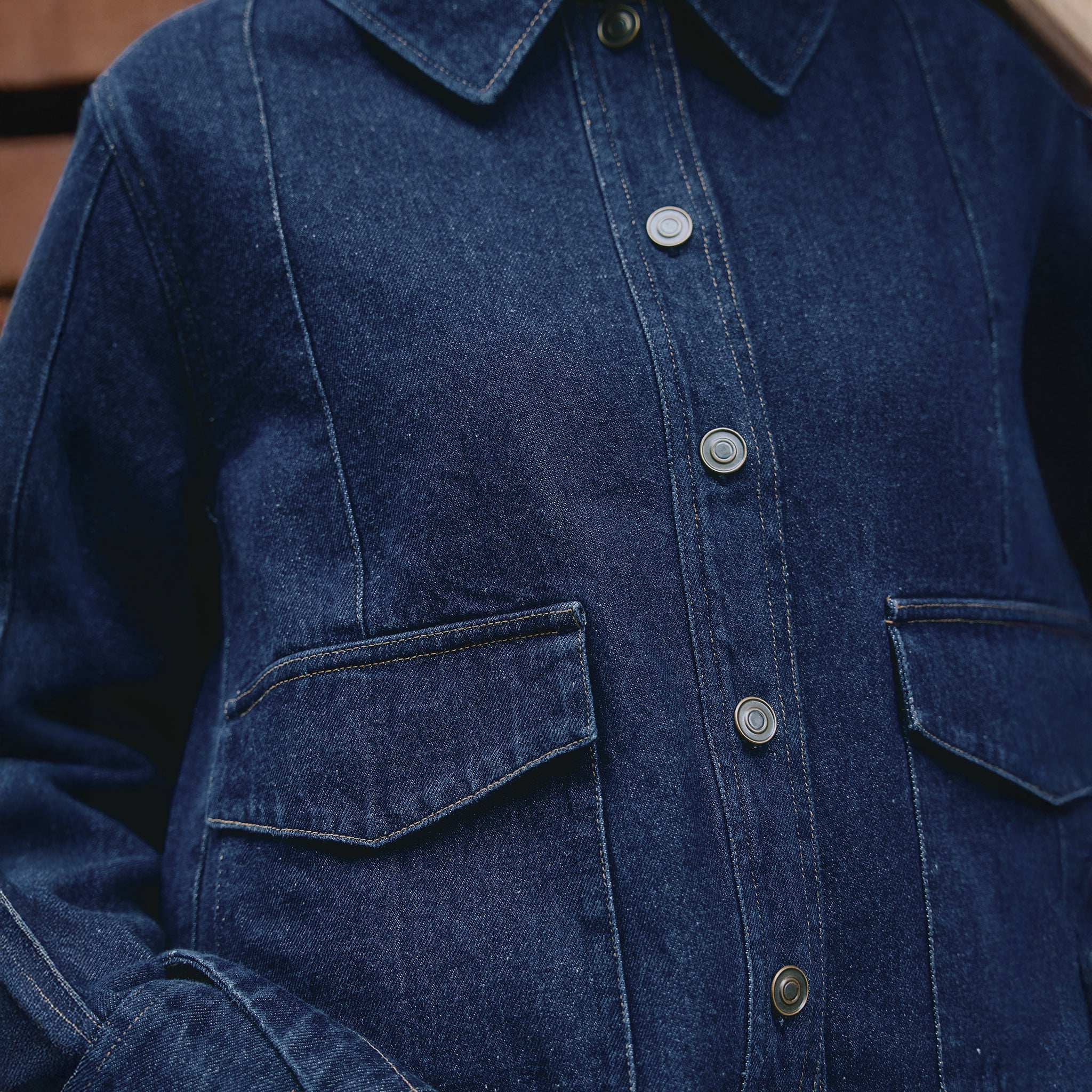 Indigo denim jacket front view, button details, casual denim outerwear, sustainable fashion