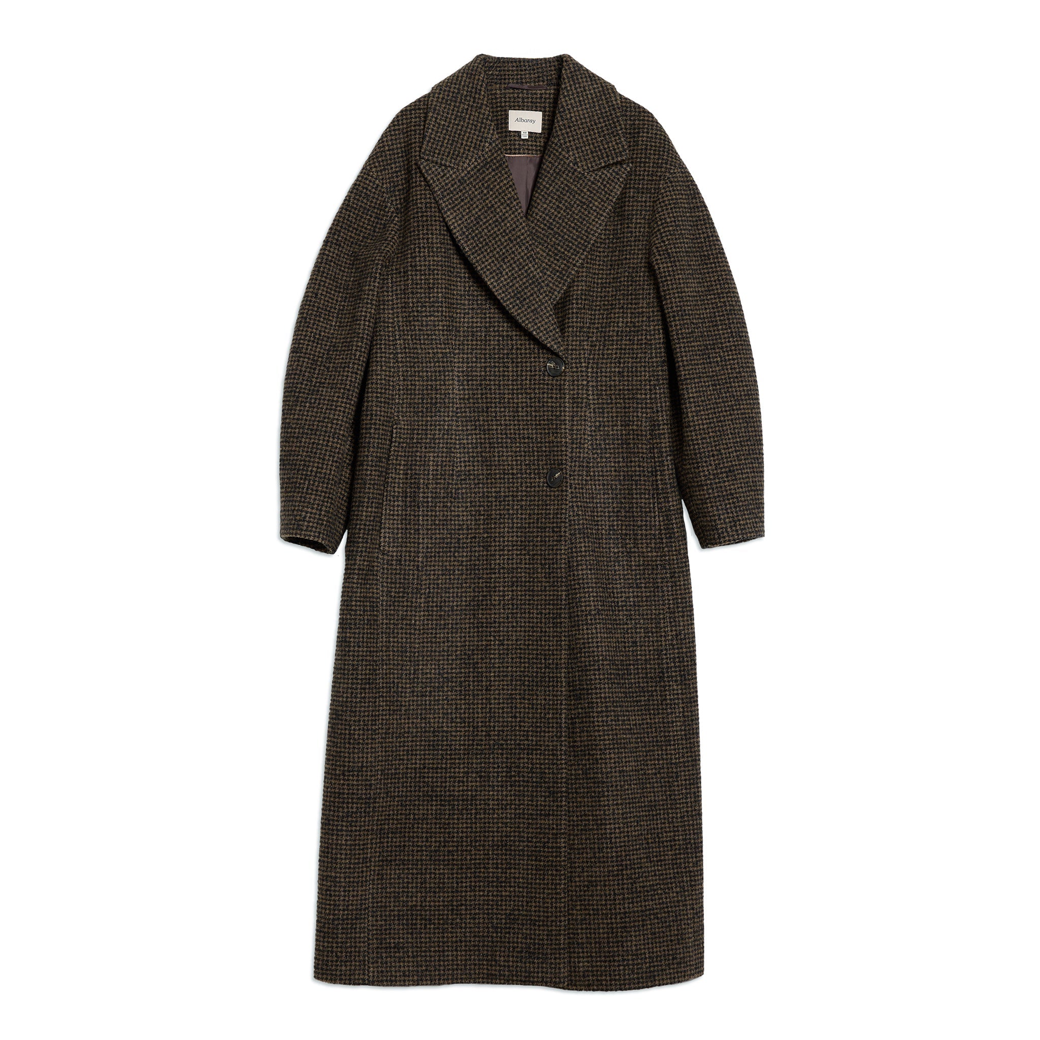 Classic check pattern wool coat with cocoon sleeves, creating a relaxed yet refined winter statement look.
