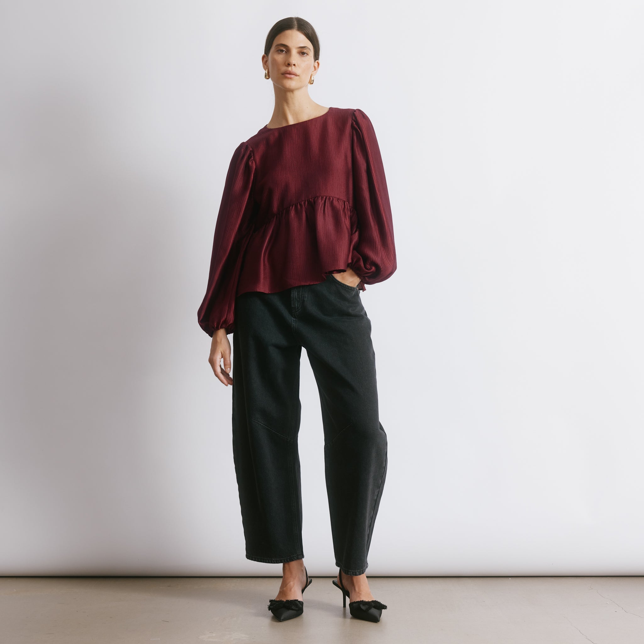 Textured satin top in deep red with elegant crinkle finish and party style  