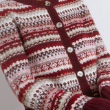 Burgundy fair isle knit styled as a short cosy wool cardigan  