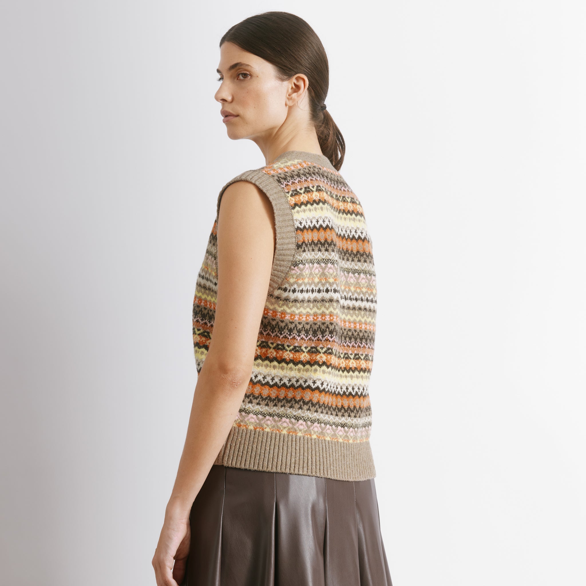 Fair isle tank in neutral tones with button through knitted vest design  