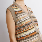 Knitted fair isle vest styled as a sleeveless wool blend top  