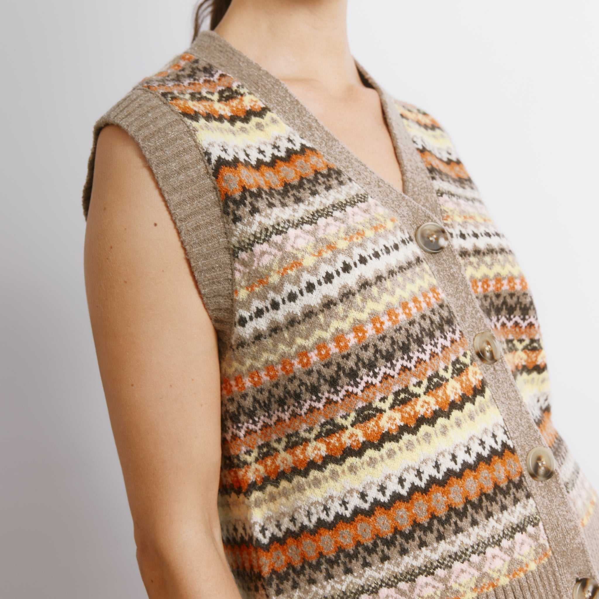 Knitted fair isle vest styled as a sleeveless wool blend top  