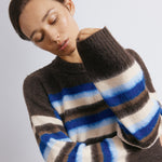 Blue and brown striped jumper styled as a cosy winter sweater in soft brushed fabric  