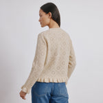 Ruffle knit jumper in soft wool blend with feminine pointelle details  