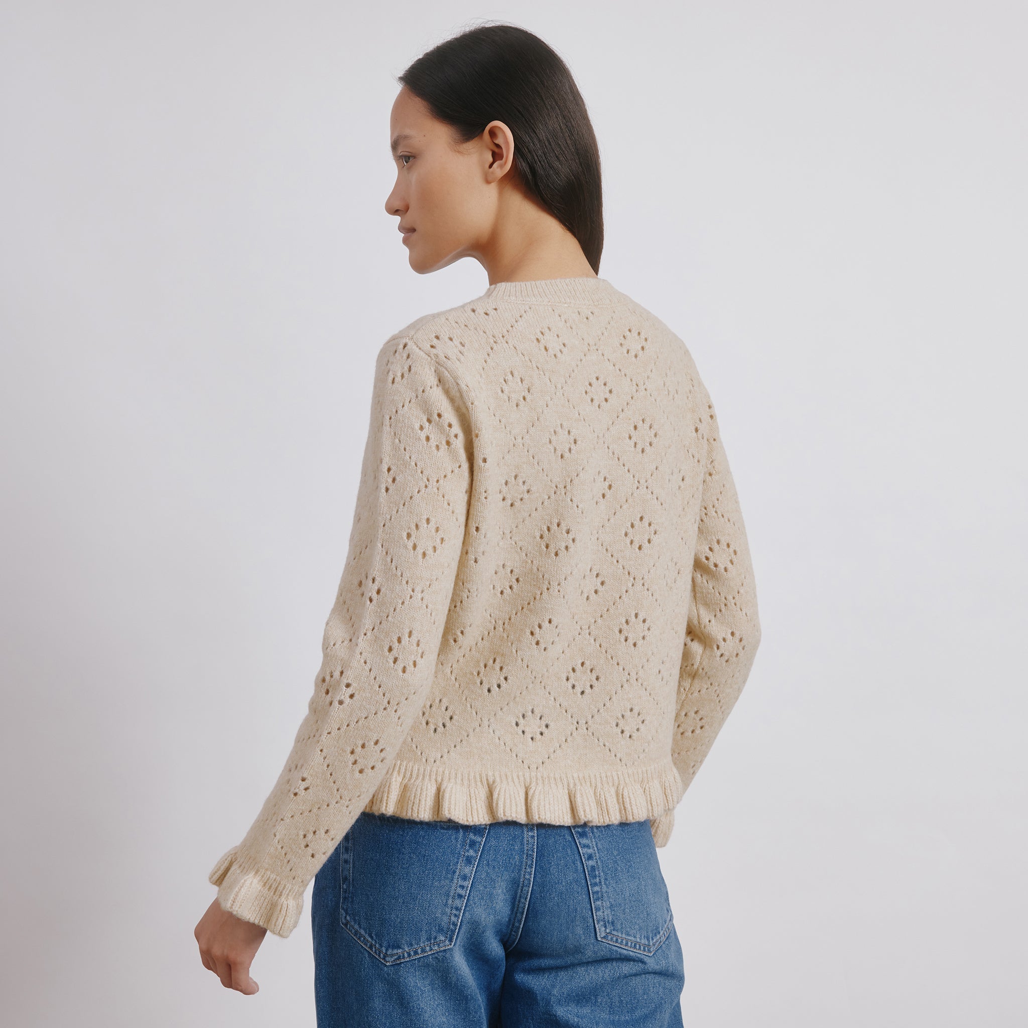 Ruffle knit jumper in soft wool blend with feminine pointelle details  
